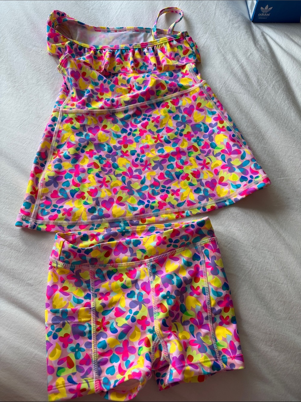 Ruffle Butts - 2 piece bathing dress and shorts in bright and neon colors.